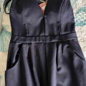 Navy one piece with pants.